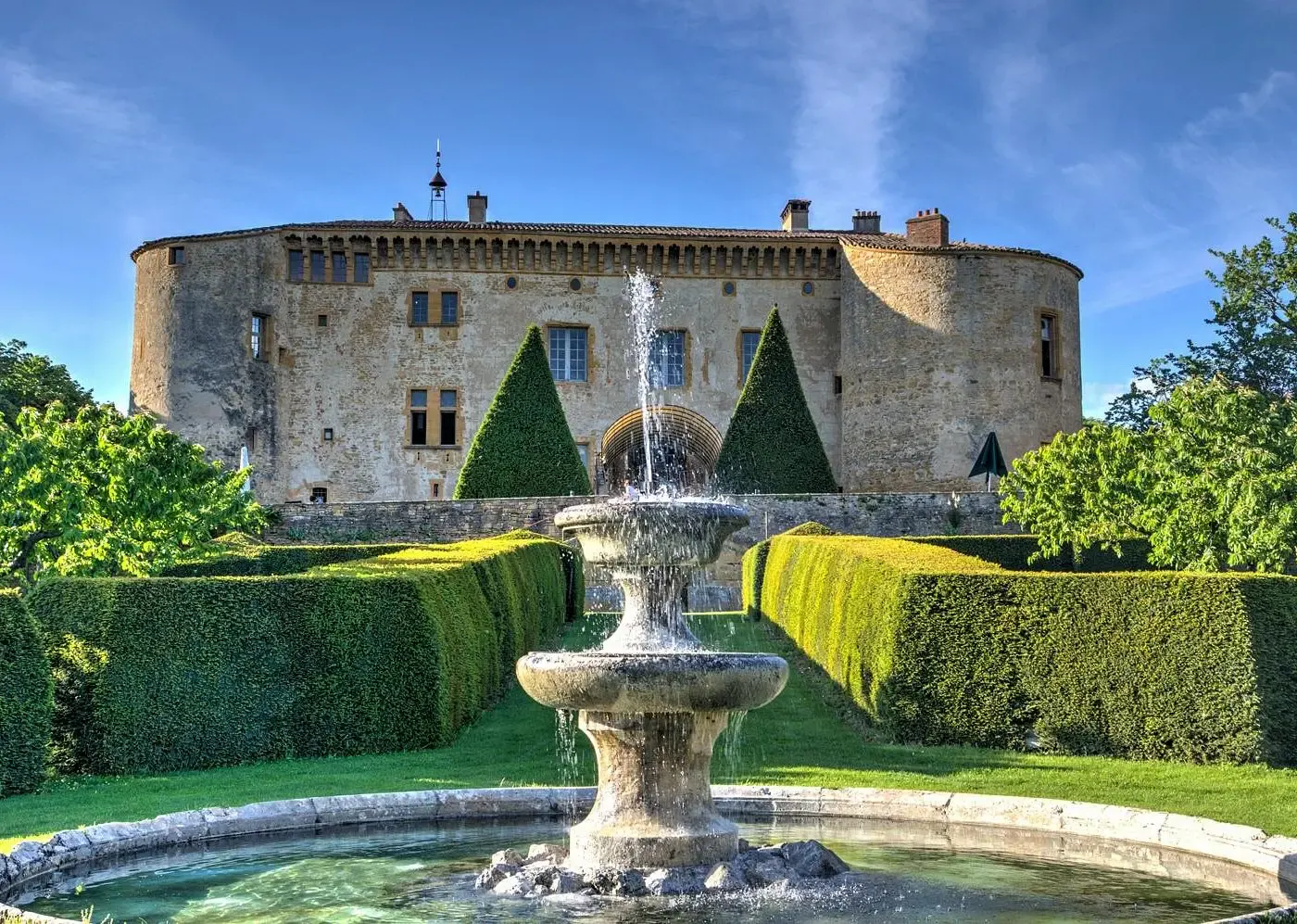 Château de Bagnols, its formal gardens and fountain